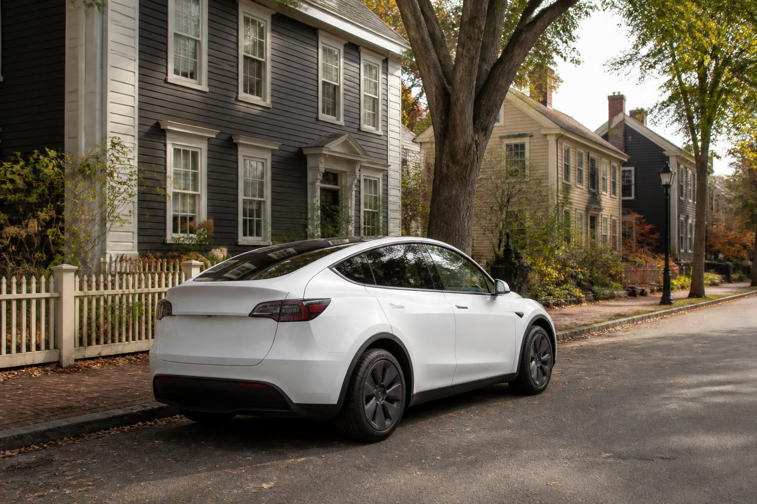 Electric vehicle parked on a quiet Salem neighborhood street.